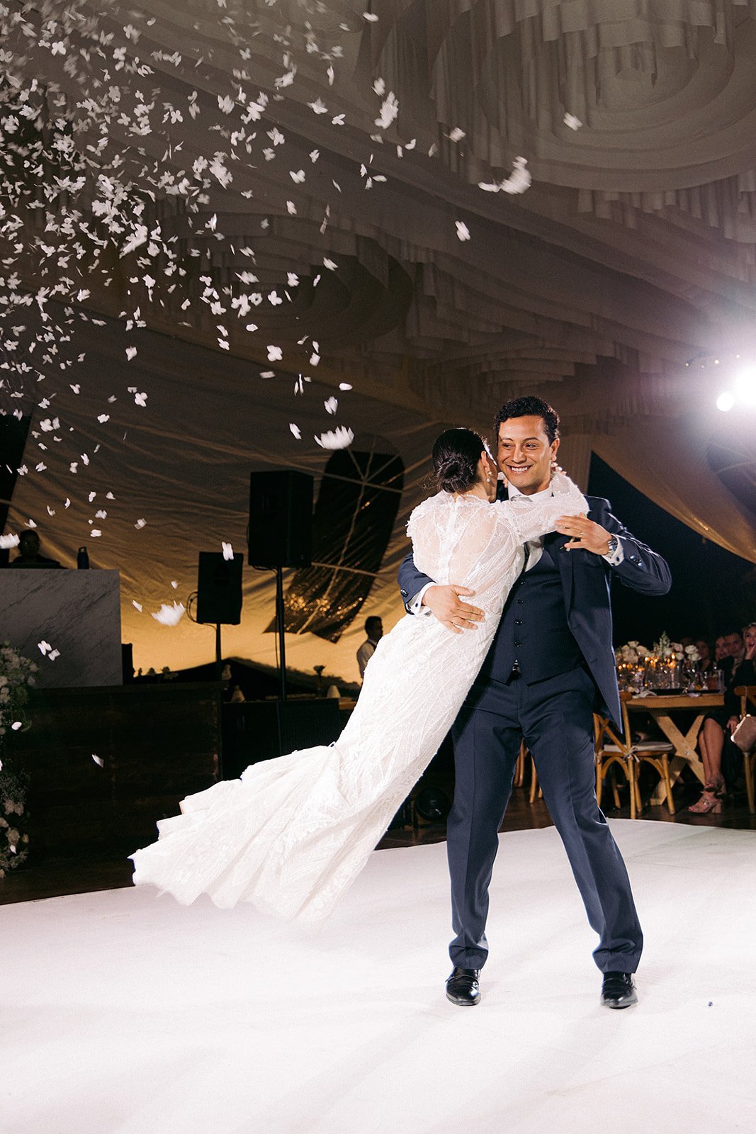 Said and Cari's first dance beneath colorful stage lighting
